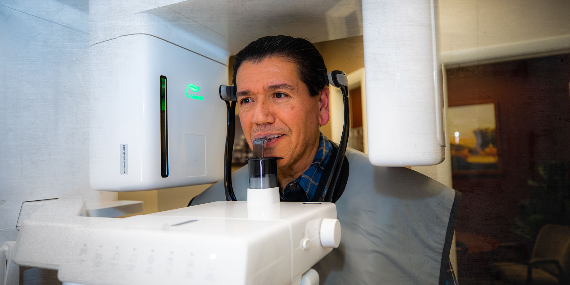 patient undergoing dental 3D scanning for dental procedure