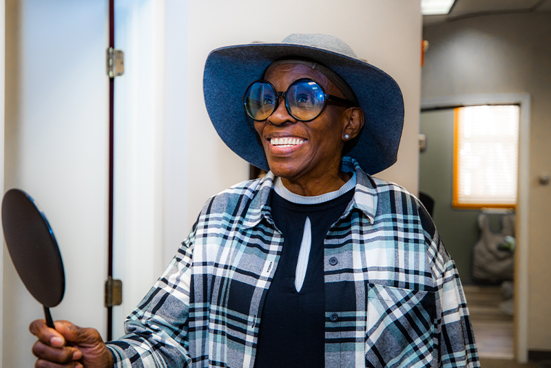 Patient smiling after their dental procedure