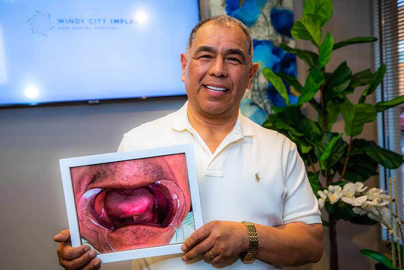 Patient smiling confidently after their dental procedure