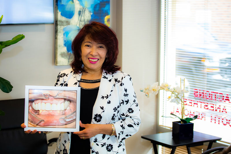 Headshot of [patient after their dental procedure